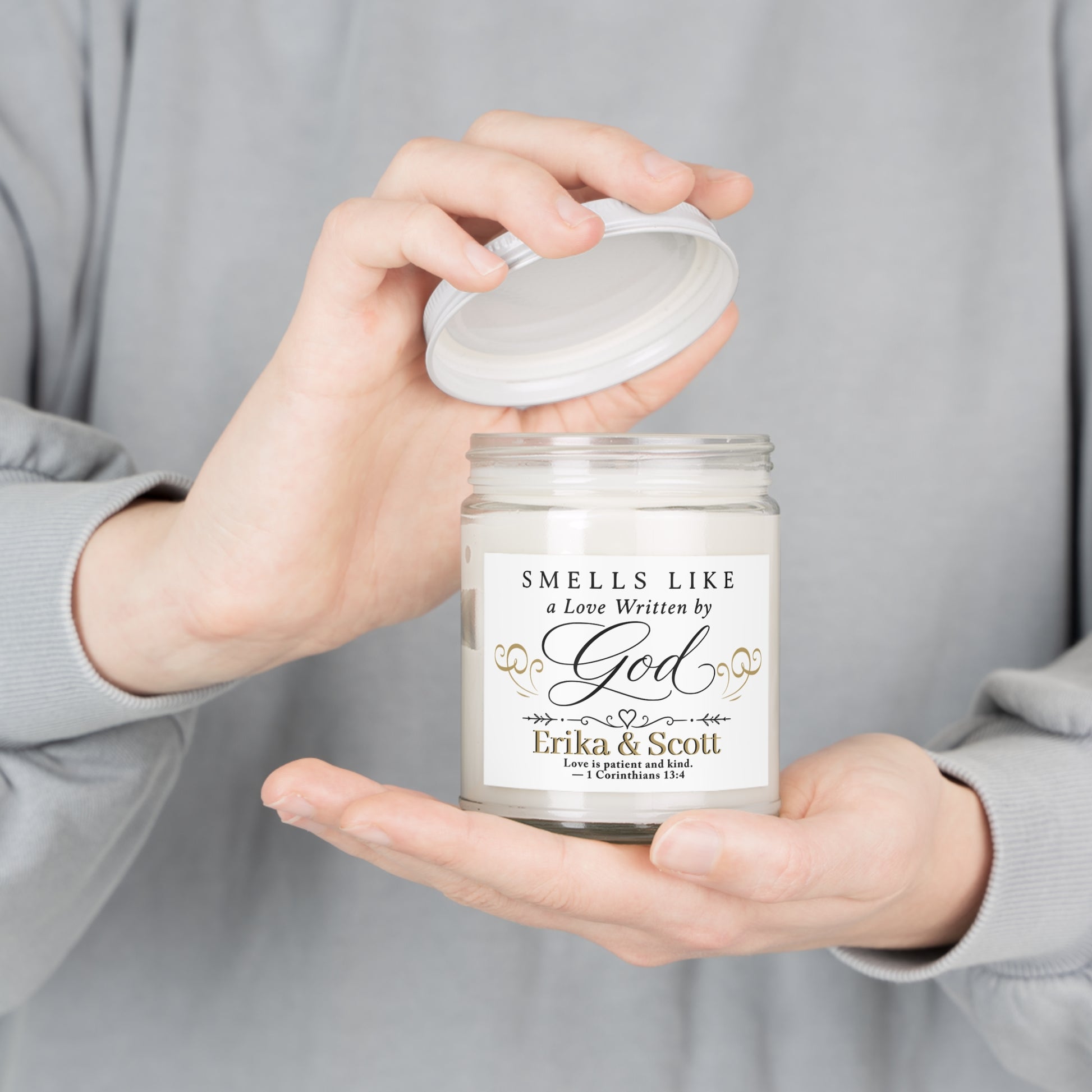 Candle with "Smells Like a Love Written by God" and "Erika & Scott" text.
